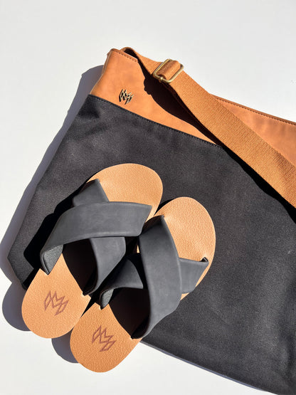 Monroe Messenger bag in Jet with brown adjustable strap paired with Ellie Cross in Jet