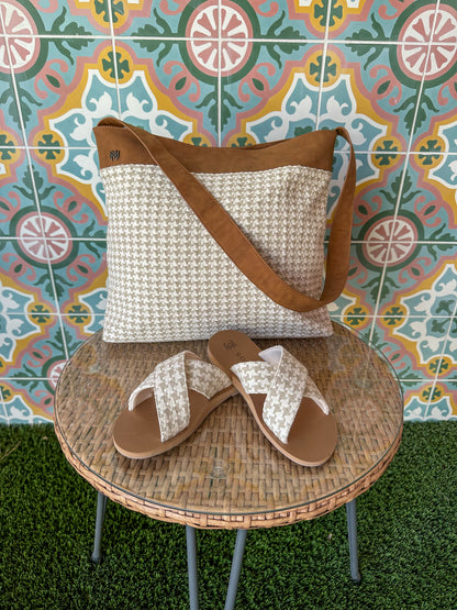 Ellie Cross in Mazen memory foam footbed with arch support and a woven cream criss cross strap