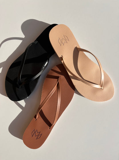 Neutral colours in the Lux flip flop with minimalist thin strap and arch support.