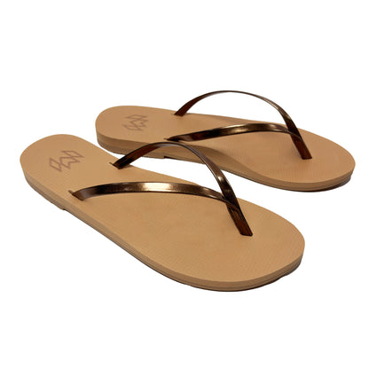 Lux Bronzed minimalist flip flop with thin brown metallic strap and beige arch support footbed