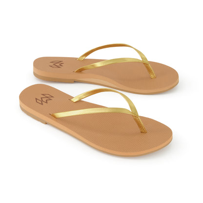 Lux Golden minimalist flip flop with thin gold metallic strap and beige arch support footbed