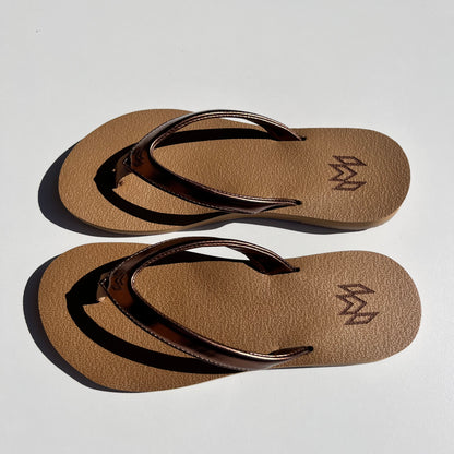 Marley Golden flip flop with memory foam and arch support with a gold metallic strap with beige footbed