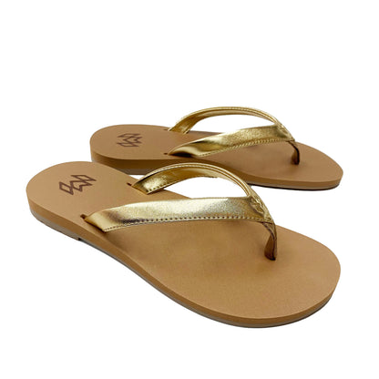 Marley Golden flip flop with memory foam and arch support with a gold metallic strap with beige footbed