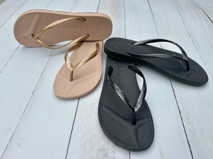 Playa Tequila Sunrise and Onyx beach flip flop waterproof sandal with toe pillow, arch support and toe post anchor in gold and black